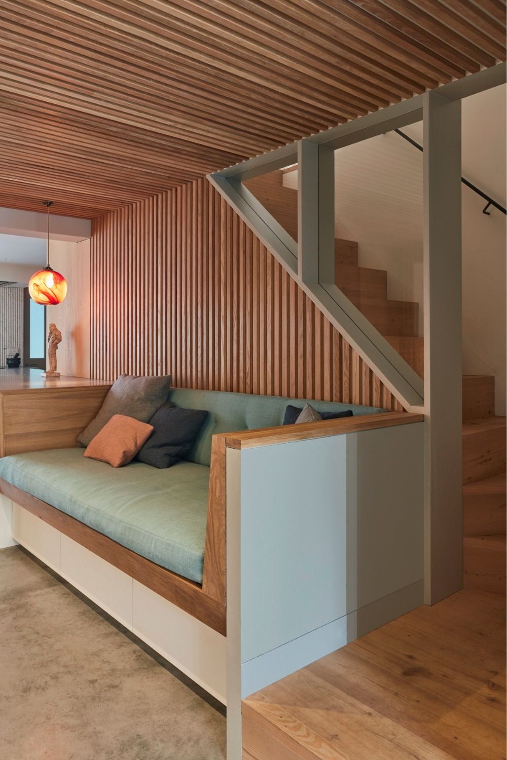 evoke projects ltd islington bespoke timber built in sofa and batten clad walls and ceiling