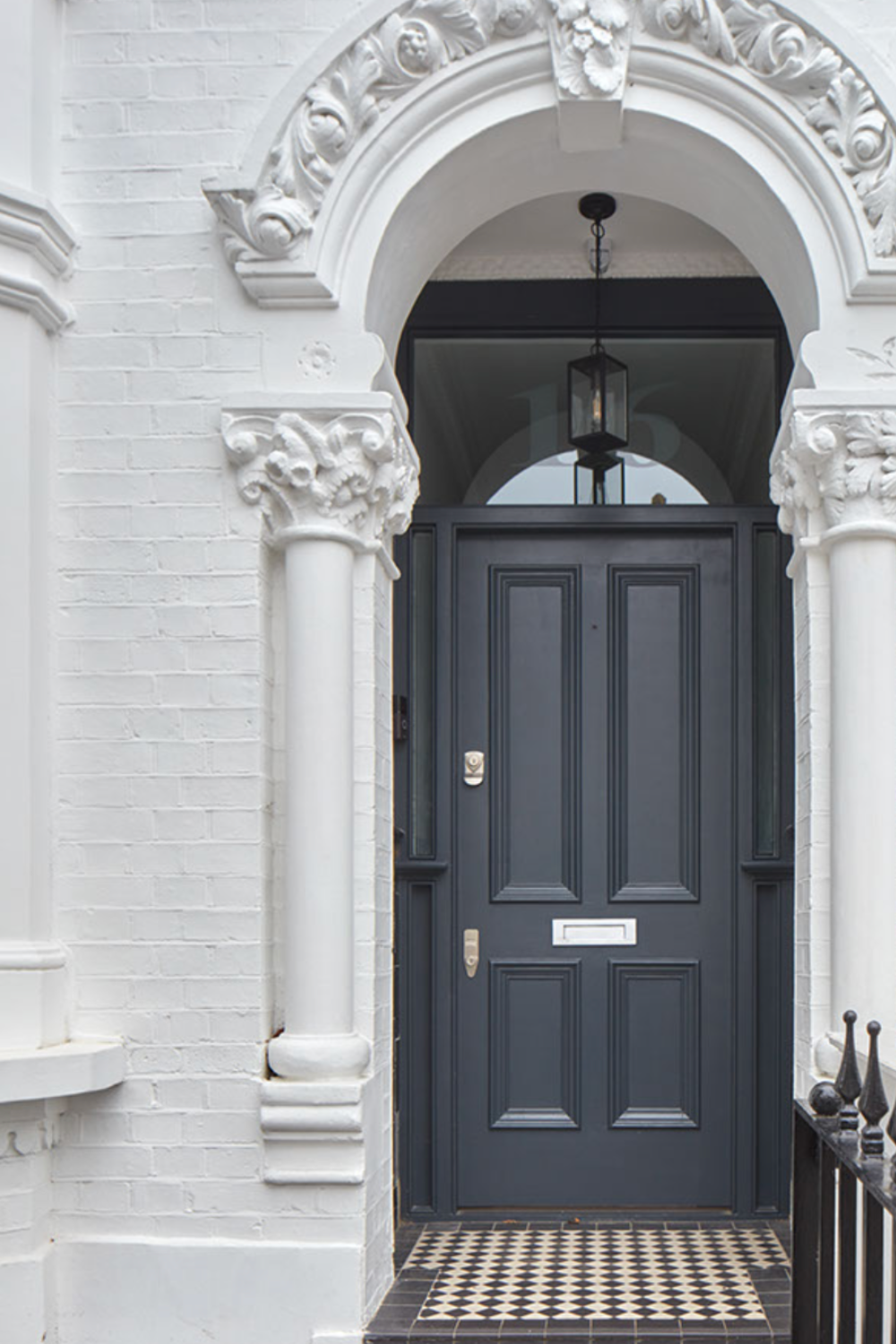 Architectural detail columns and arch around Victorian front door