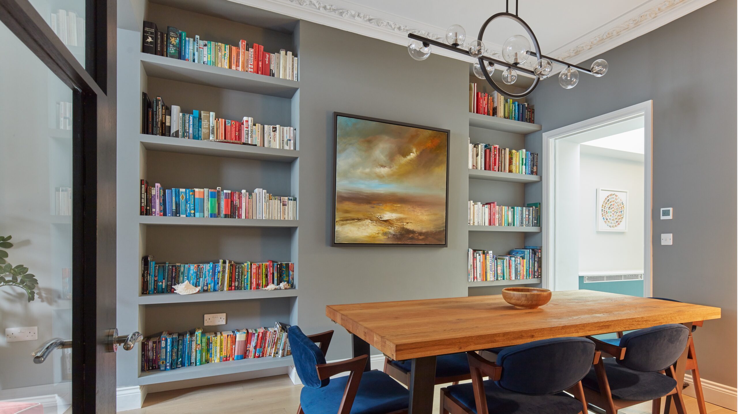 Dining room with built in bookshelves 