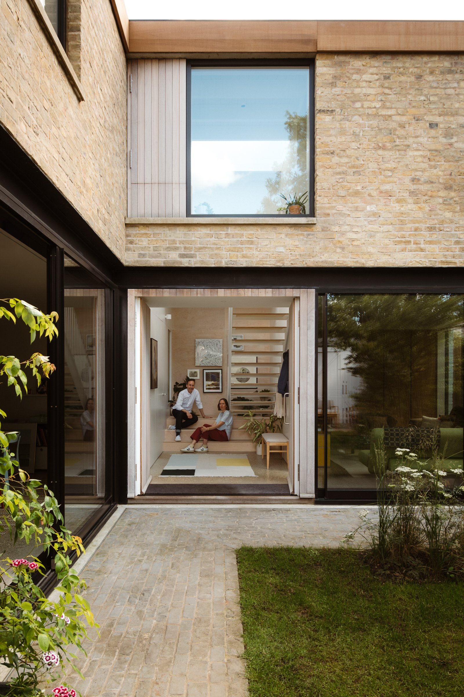 evoke projects ltd islington bespoke hidden kitchen behind full height doors